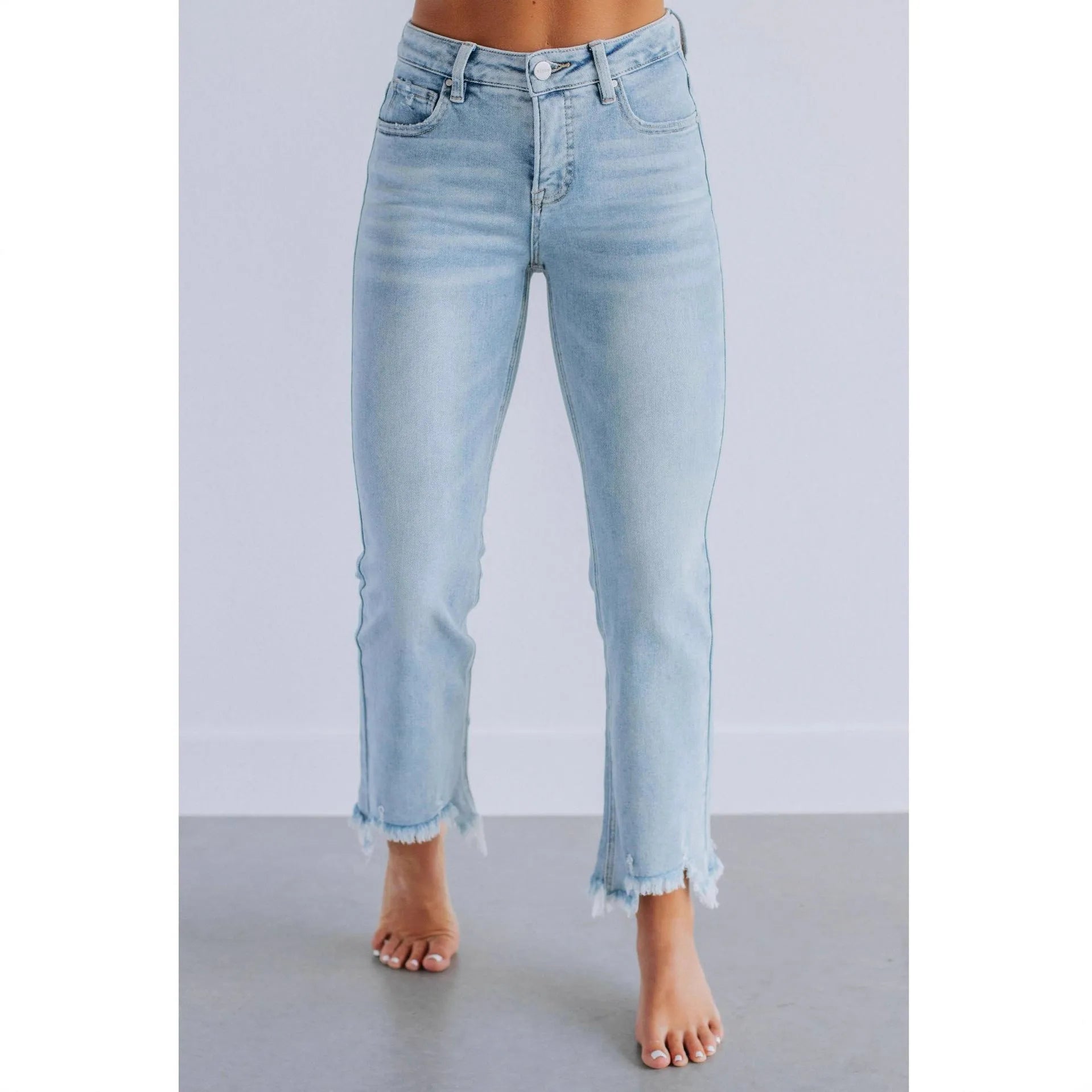 Women's solid colour denim trousers with hand-worn distressing in dark blue and light blue washes