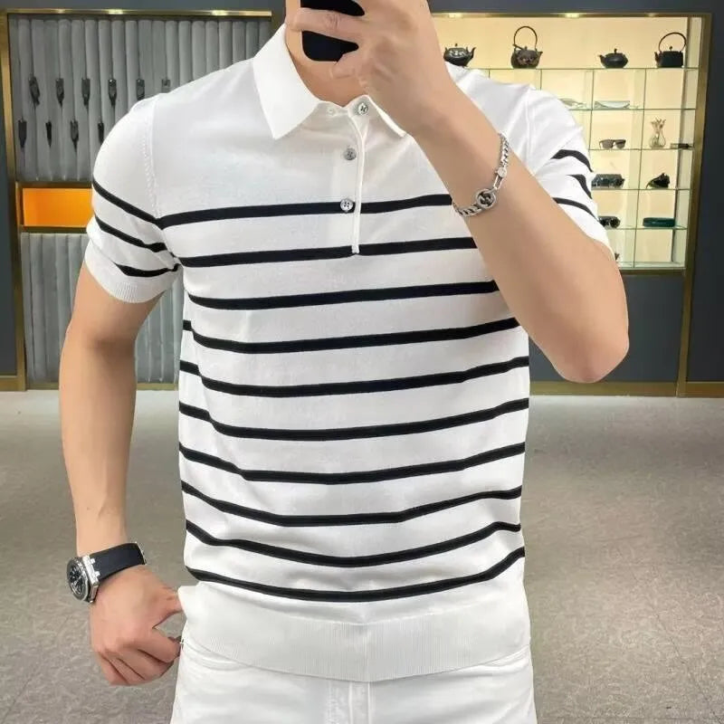 Black and white striped knitted pullover t-shirt with a lapel collar, laid flat.