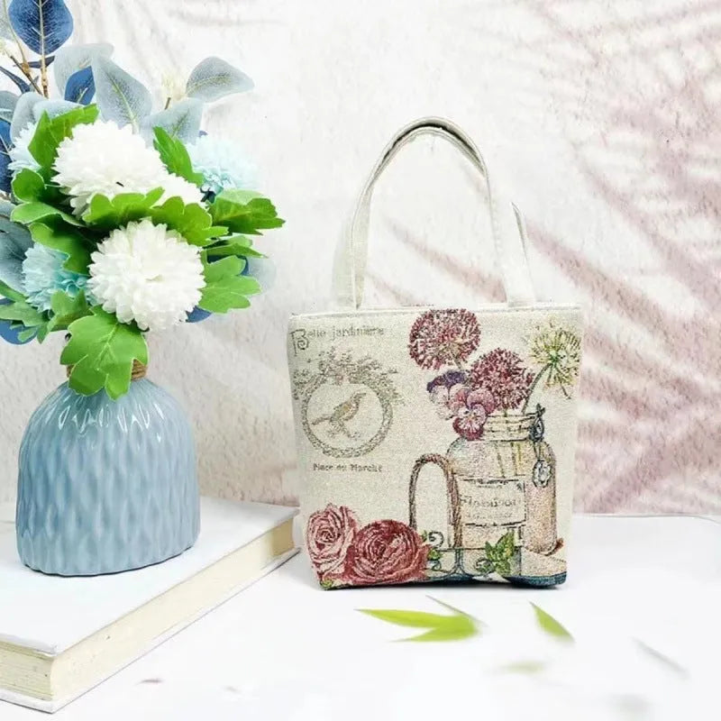 Double-sided gold wire embroidered canvas handbag in small, medium, and large sizes with patterned options.