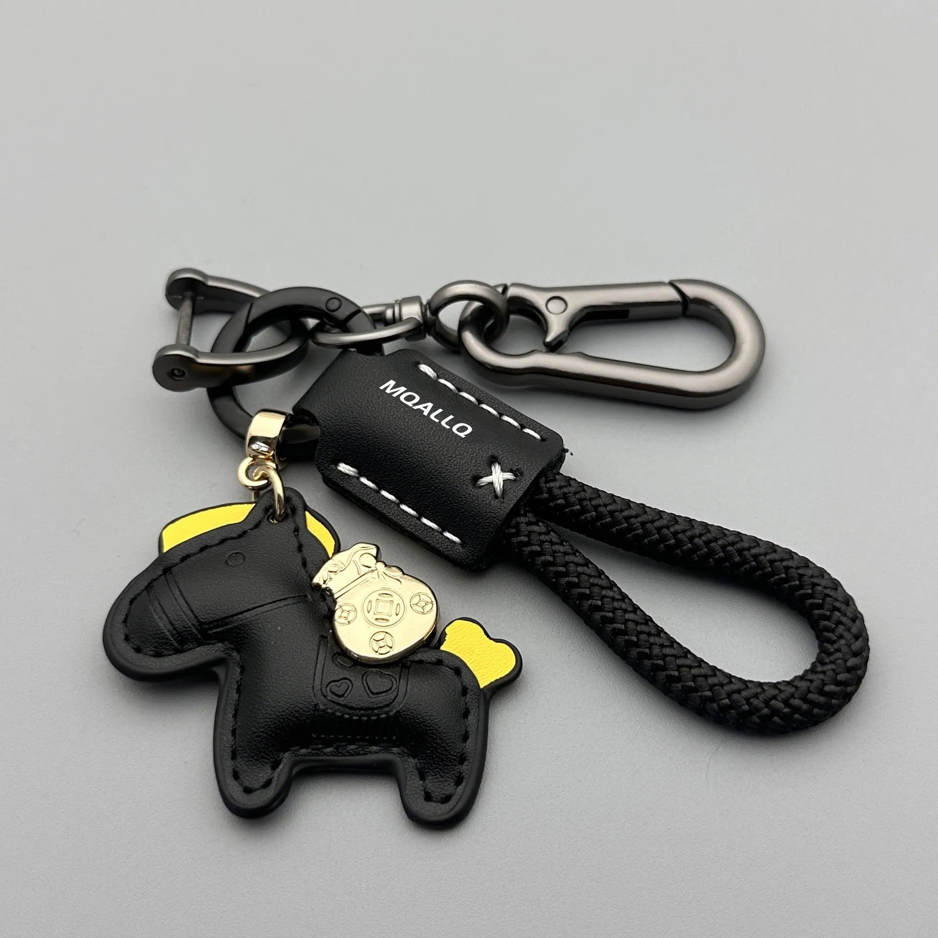 Handmade cowhide car key ring pendant with zinc alloy pony belt buckle on a colourful flanelle rope.