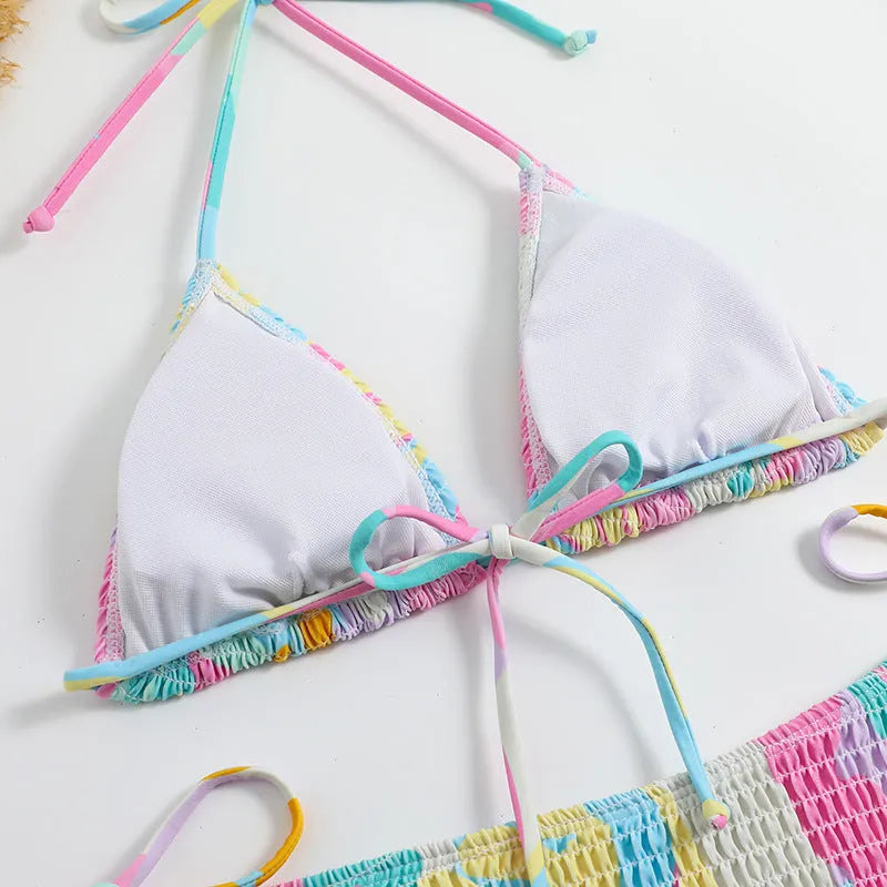 Multicolour floral gradient triangle bag bikini swimsuit with smocking detail for women.