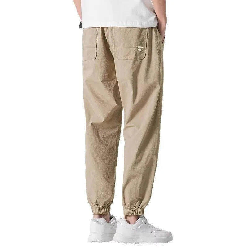 Men's fashion loose cuffed cargo pants in khaki, polyester fabric, autumn casual trousers with cuffed hem