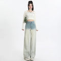 Women's gradient blue wide-leg straight-leg cotton denim trousers on a hanger.