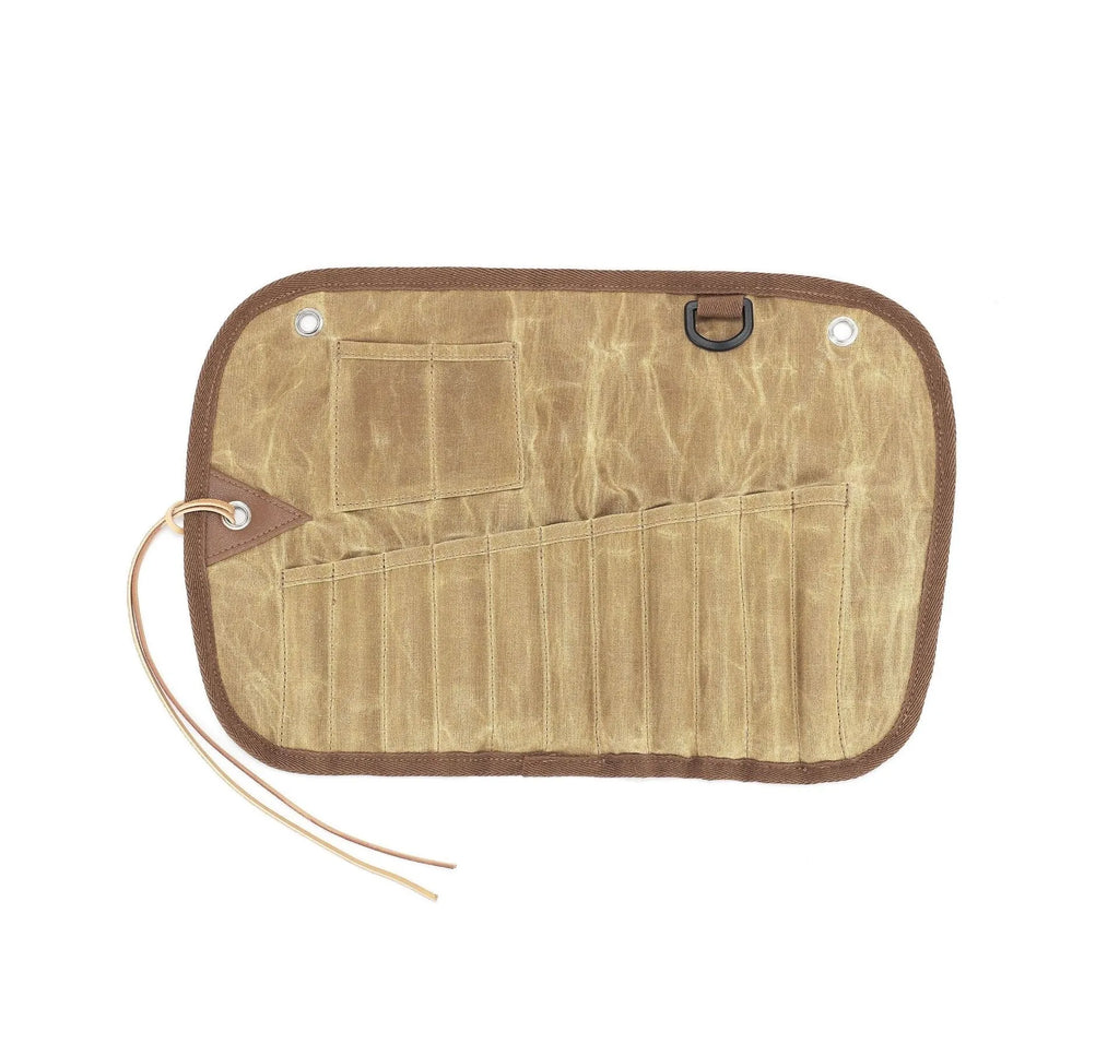 Waxed canvas tableware storage bag open to show wooden handle knife, fork, spoon, butter knife, and chopsticks.