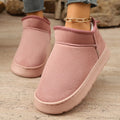 Short snow boots for women with thick non-slip soles and plush lining in black synthetic leather