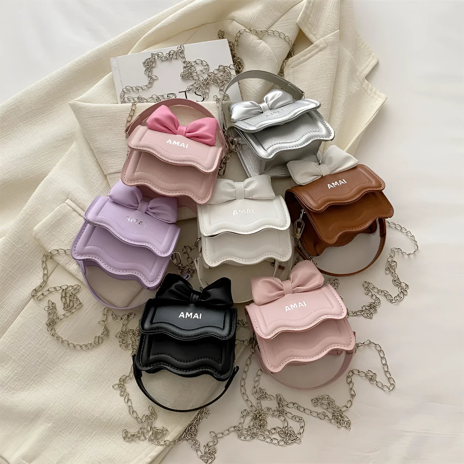 A women's mini crossbody bag in PU leather with an adjustable strap, shown in multiple colour options.