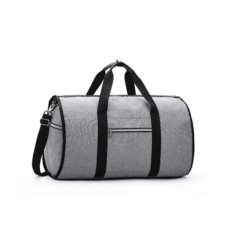 Medium-sized cylindrical travel bag in black Oxford cloth with a zipper and carrying handles.