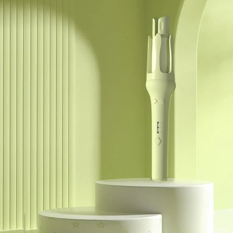 White and pink automatic hair curler with a rotating 32mm ceramic barrel and digital temperature display.