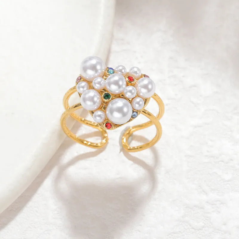 Open mouth women's ring with zircon electroplating and pearl elements in round or heart shape