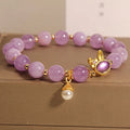 Mauve jade rabbit bracelet with crystal hare head design on adjustable wristband