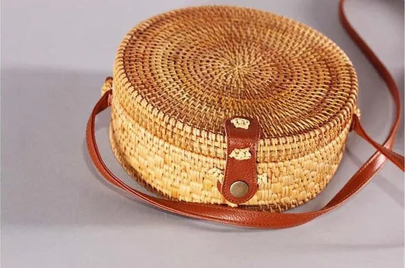 Handmade round bohemian straw crossbody bag with leather strap for summer