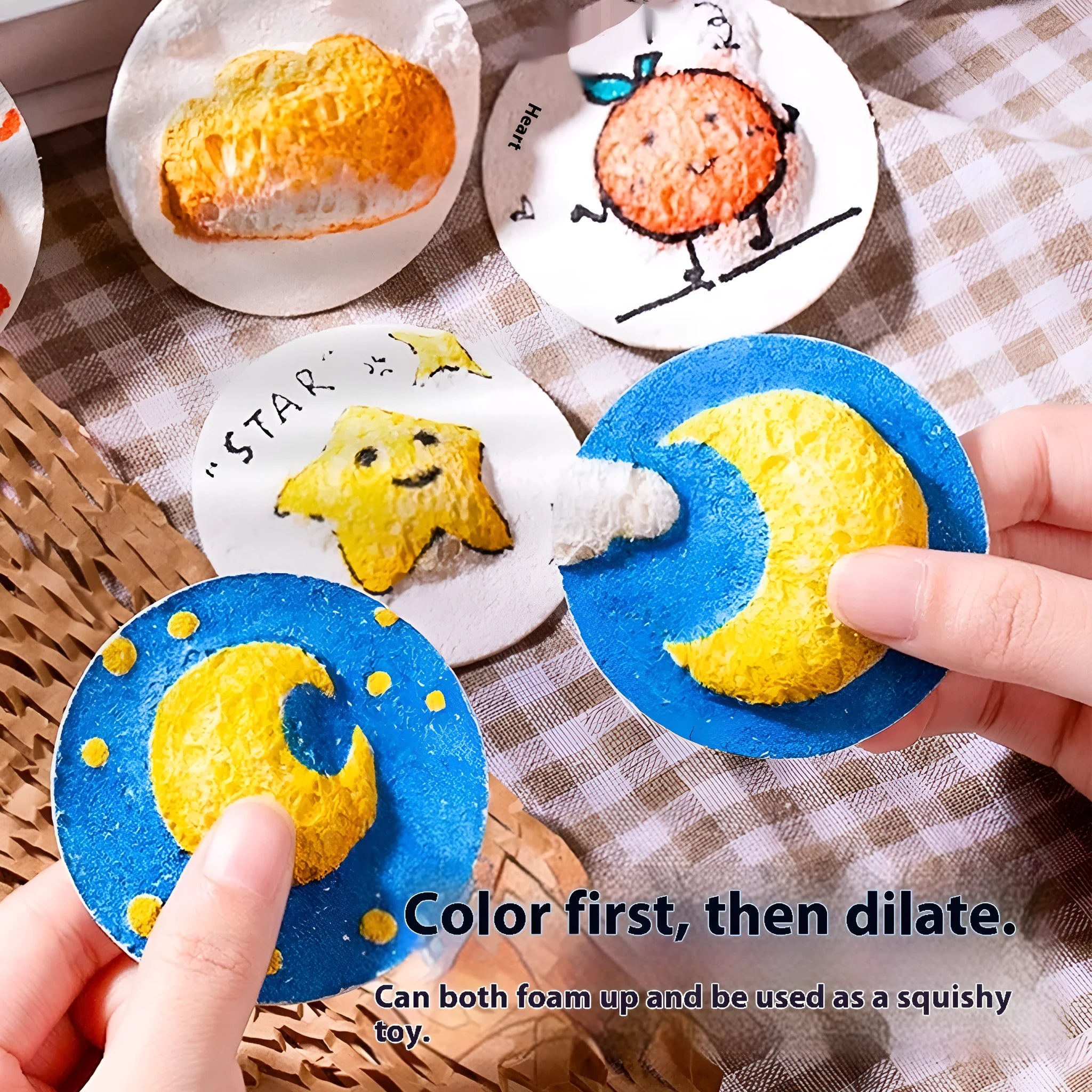 Painting sponge set showing heart-shaped, round and square sponges with six fountain pens on wood pulp paper