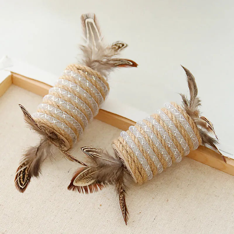 Beige interactive cat toy with hemp rope scratching post, colourful feathers, and a rolling sound mechanism.