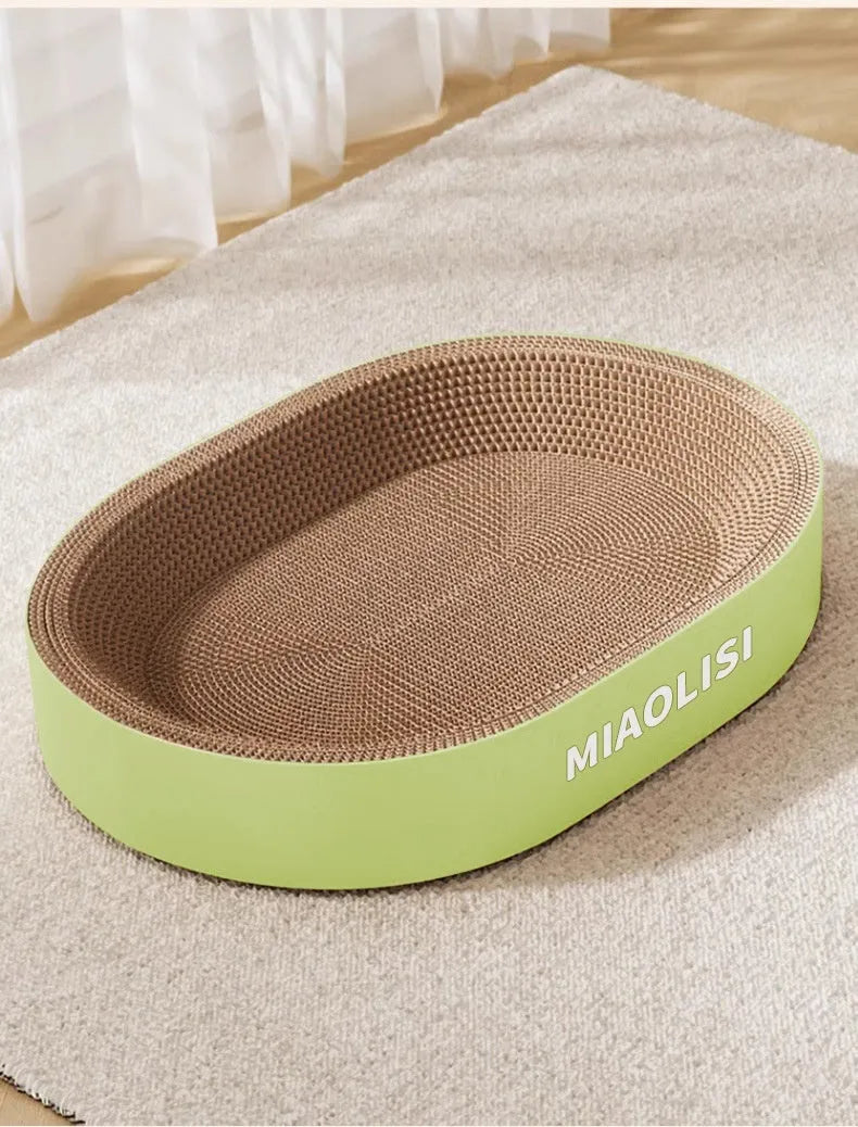 Green oval corrugated paper cat scratch board and nest bed, 55cm diameter