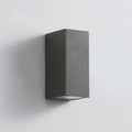 Modern black aluminium LED wall lamp with glass shade and silicone rubber trim.