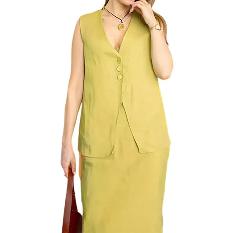 Women's loose blue polyester two-piece suit with sleeveless vest and long skirt on a hanger.