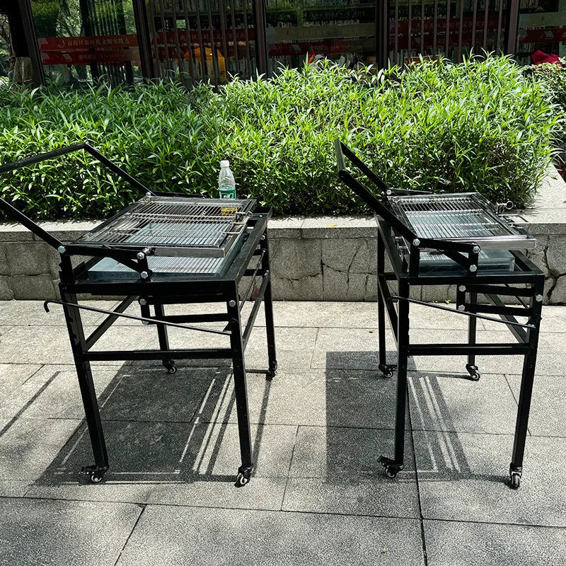 Foldable large charcoal barbecue stove grill for outdoor garden and camp use.