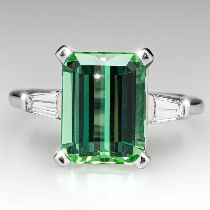 Square green electroplated copper ring on a white surface, geometric design, available in UK ring sizes No 6 to No 10