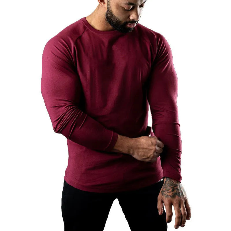 Men's tight-fitting long sleeve cotton sports T-shirt in multiple colours on a size chart.