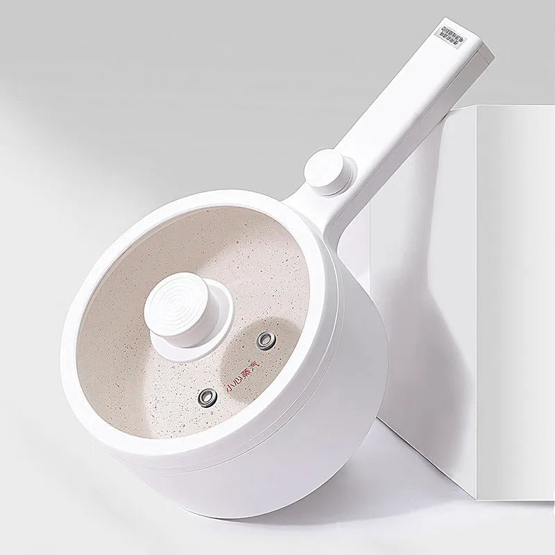 White and green portable electric cooking pot with multi-function controls and international plug