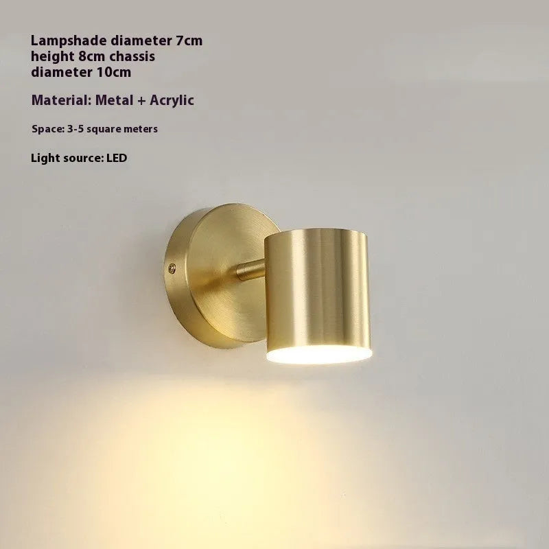 Rotatable bedside wall lamp with golden mirror front in gold finish mounted on wall