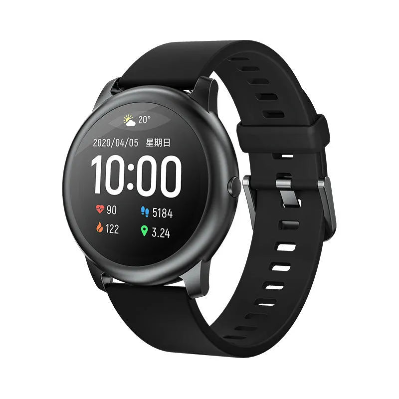Black round smart watch with heart rate and sleep monitor on wrist, alloy case and silicone band