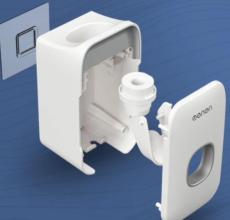 Automatic toothpaste dispenser in blue colour mounted on a bathroom wall