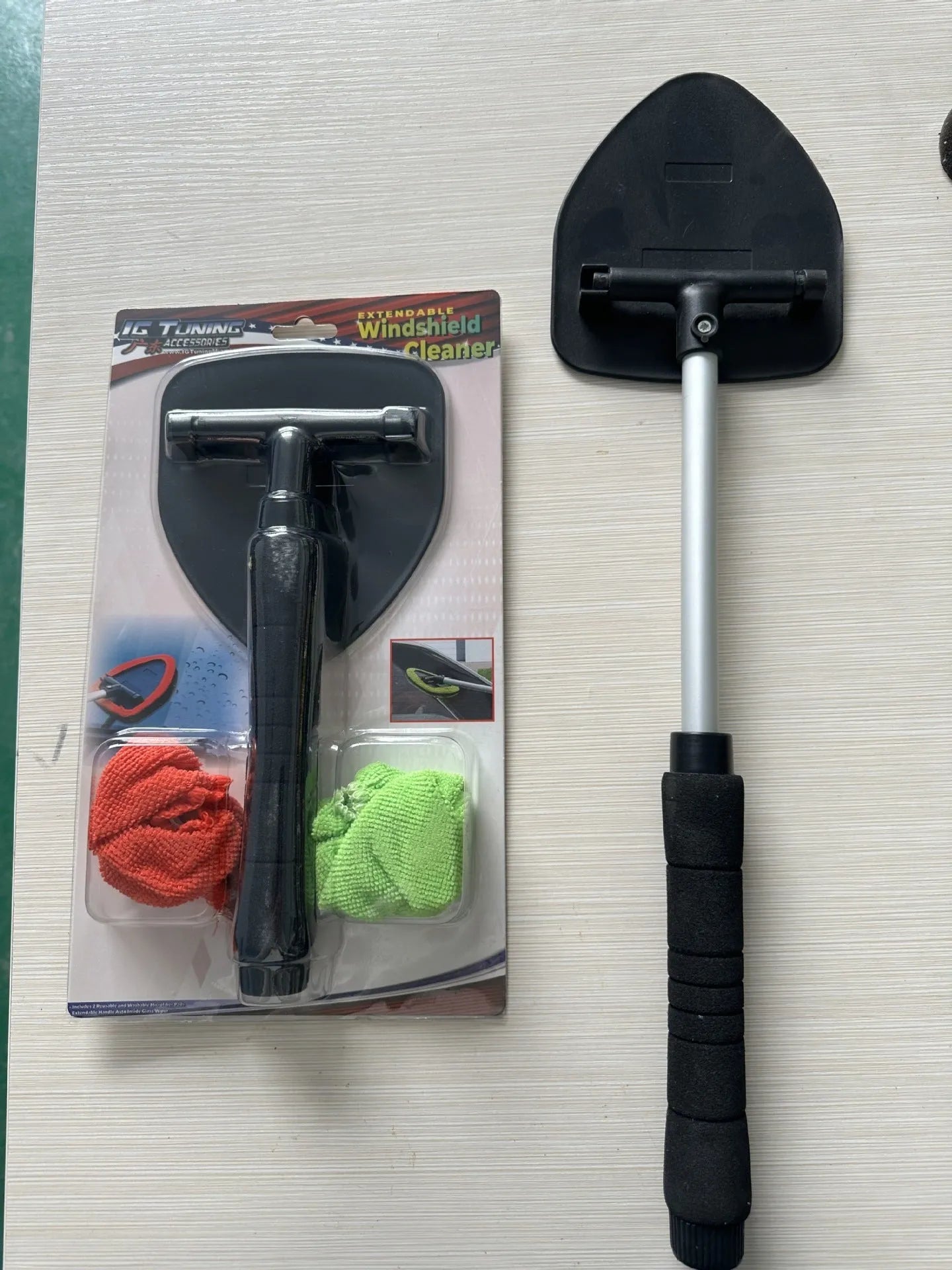 Car windshield cleaning brush with plastic bristles in green, red and blue colour options
