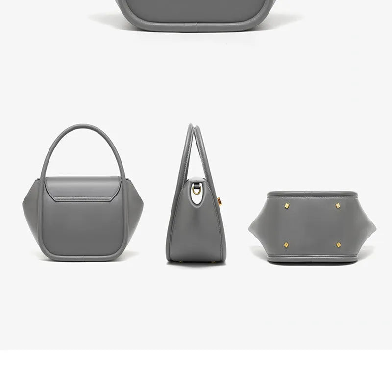 Women's leather wing tote bag in cow leather with buckle detail and cross-body strap