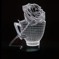 3D rose flower design night light with colour-changing LEDs on a black ABS base.
