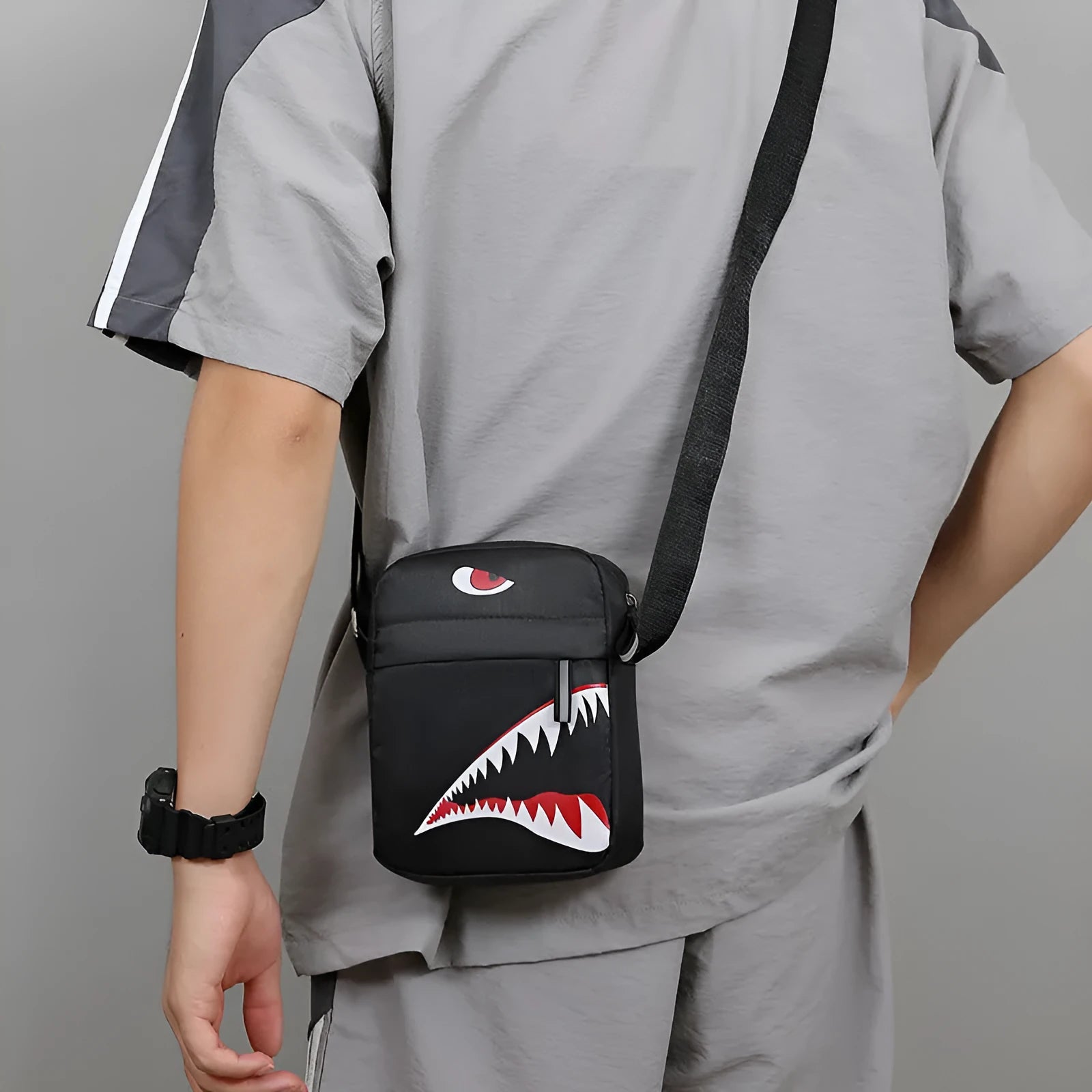 Men's small black crossbody bag with animal print, made from Oxford cloth.