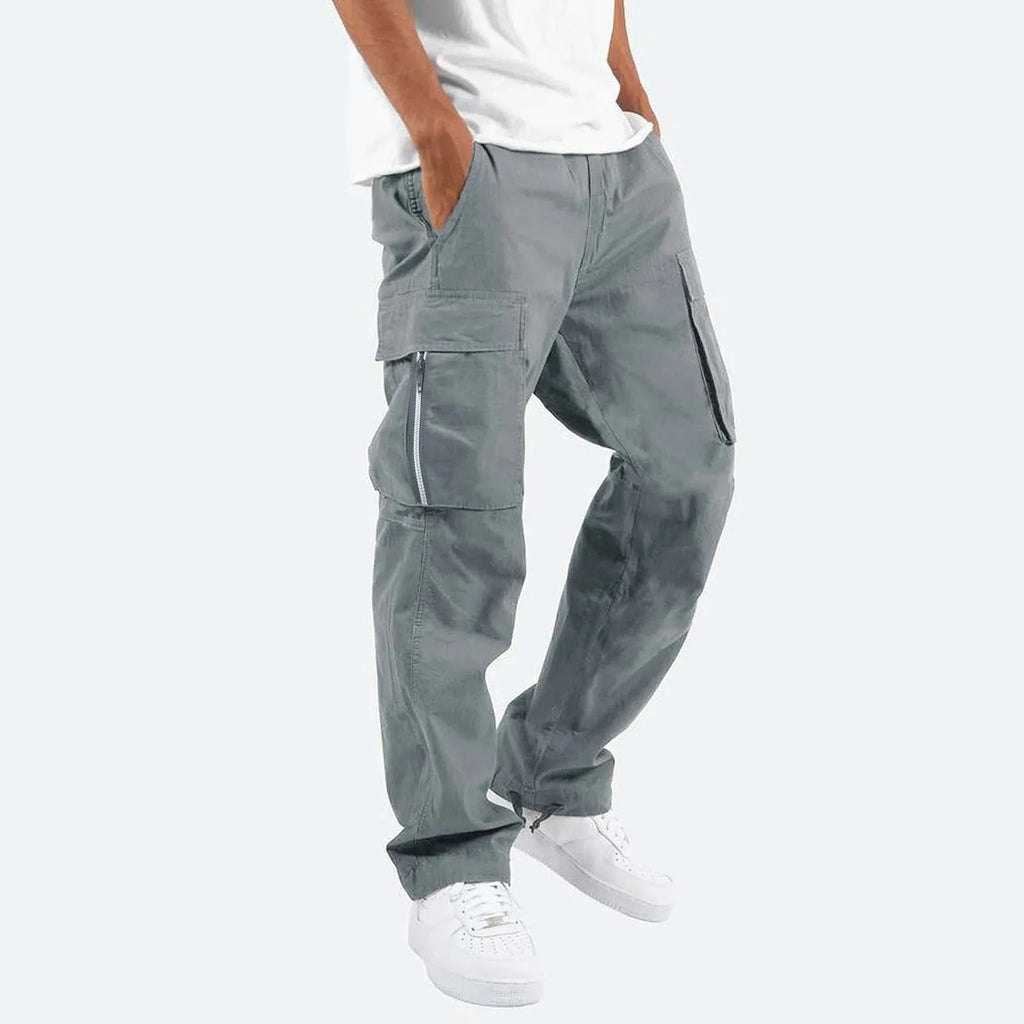 Men's cotton blend work trousers in army green with drawstring elastic waist, side view