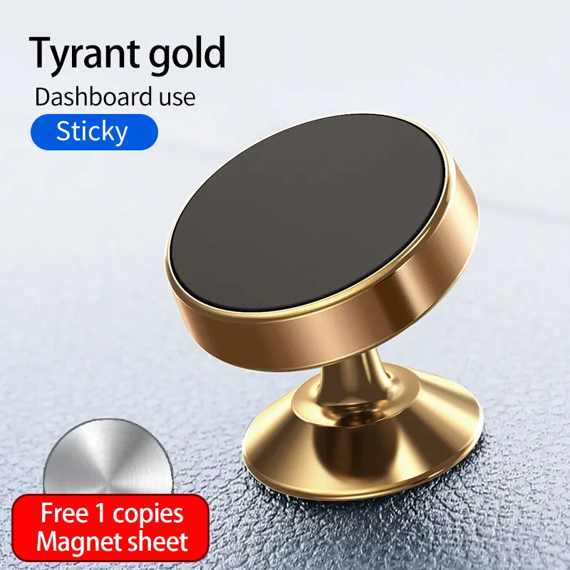Black magnetic car phone holder mounted on a car dashboard, holding a smartphone