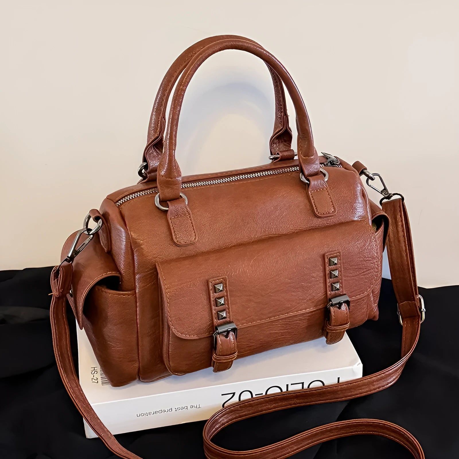 Vintage style messenger bag in PU leather, shown in a horizontal square shape with contrast stitching.