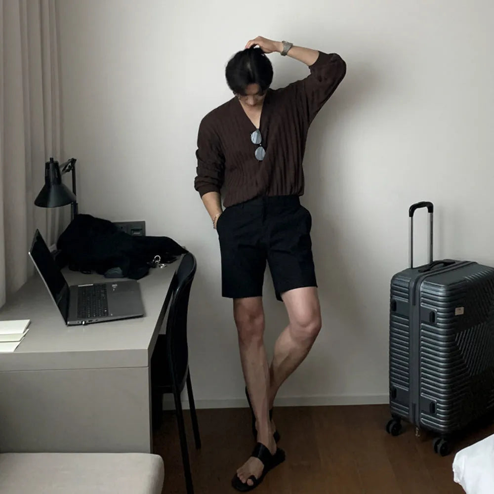 Men's straight-leg casual shorts in solid black, white, or khaki colour made from polyester fabric.