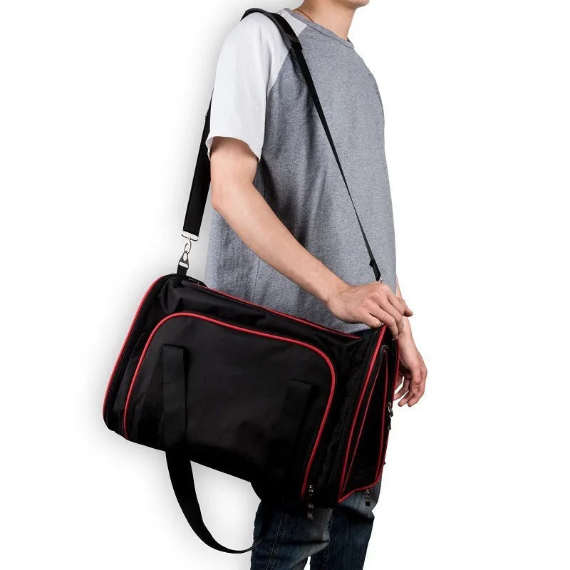 Pet trolley bag mesh carrier in black for small dogs and cats up to 7.5 kg, side view with wheels and handle