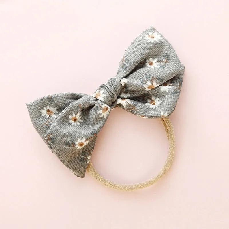 Children's knotted bow hair ring in cloth with Princess series styling