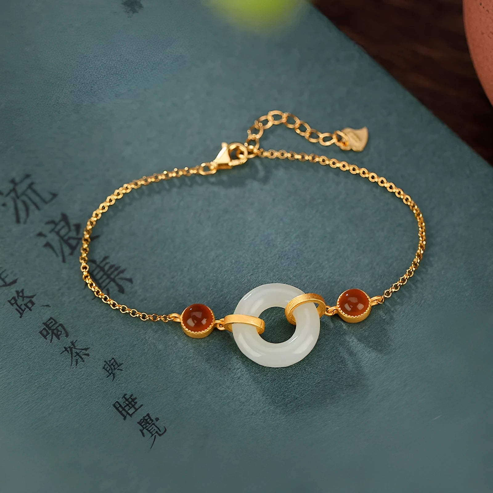 Women's silver and gold-plated bracelet with Hetian jade inlay and peace symbol buckle on adjustable band