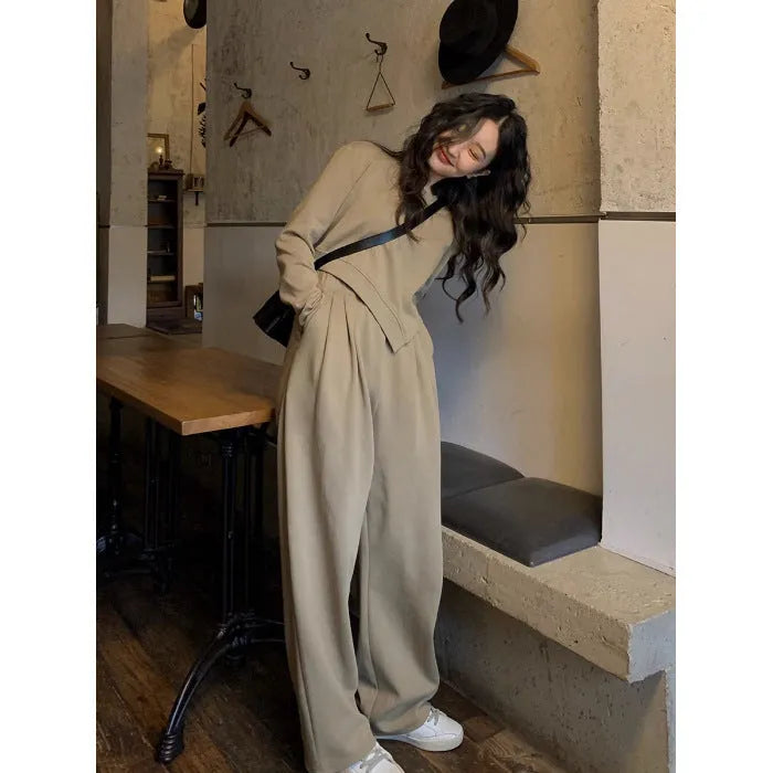 Women's khaki loose-fit polyester casual sports suit set with long sleeves and trousers.