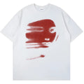 White loose-fit short sleeve cotton T-shirt with a round neck on a hanger.