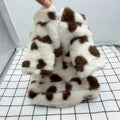 Pink polyester plush warm coat for small dog on white background showing British styling