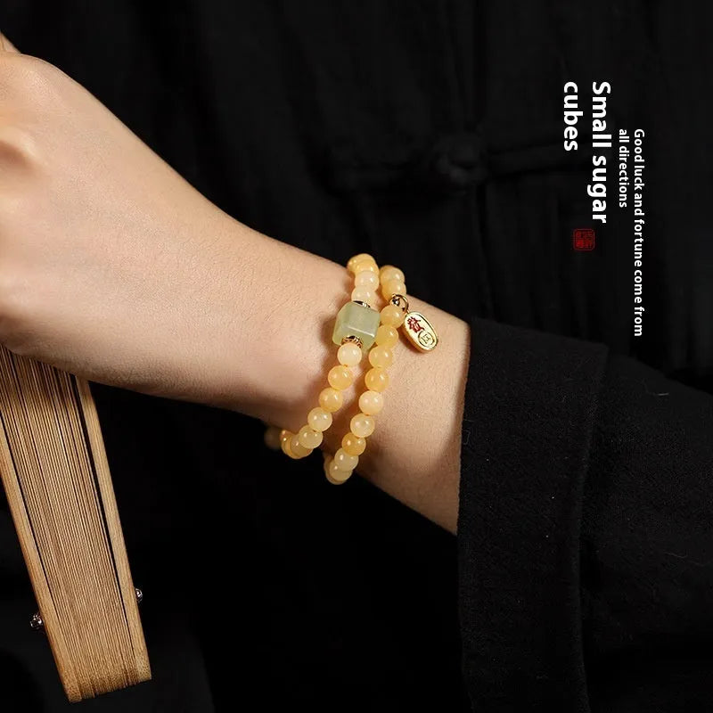 Women's hand-woven topaz bracelet with barrel beads and square sugar jade beads featuring fu character
