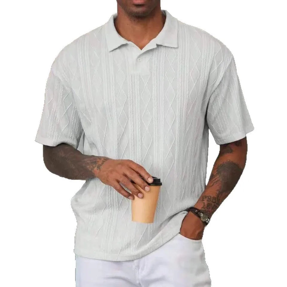 Men's short sleeve t-shirt with a retro button lapel detail and slit hem, in a solid colour.