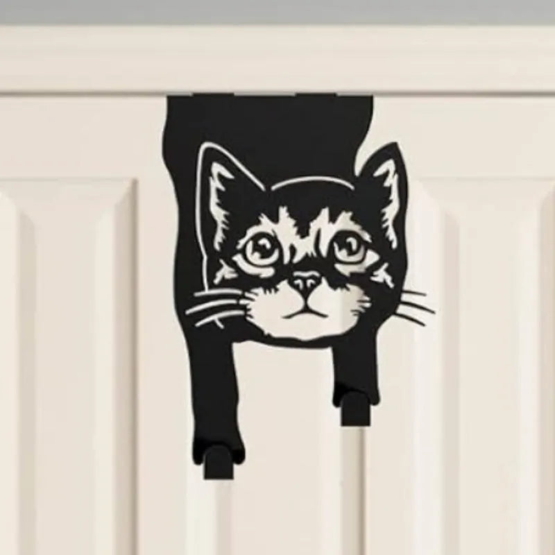 Black iron cat-shaped decorative wall hook for doors and rooms.