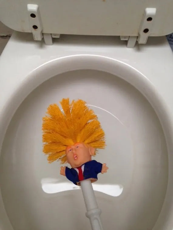 Yellow plastic Donald Trump novelty toilet brush with hanging slot, 40cm length