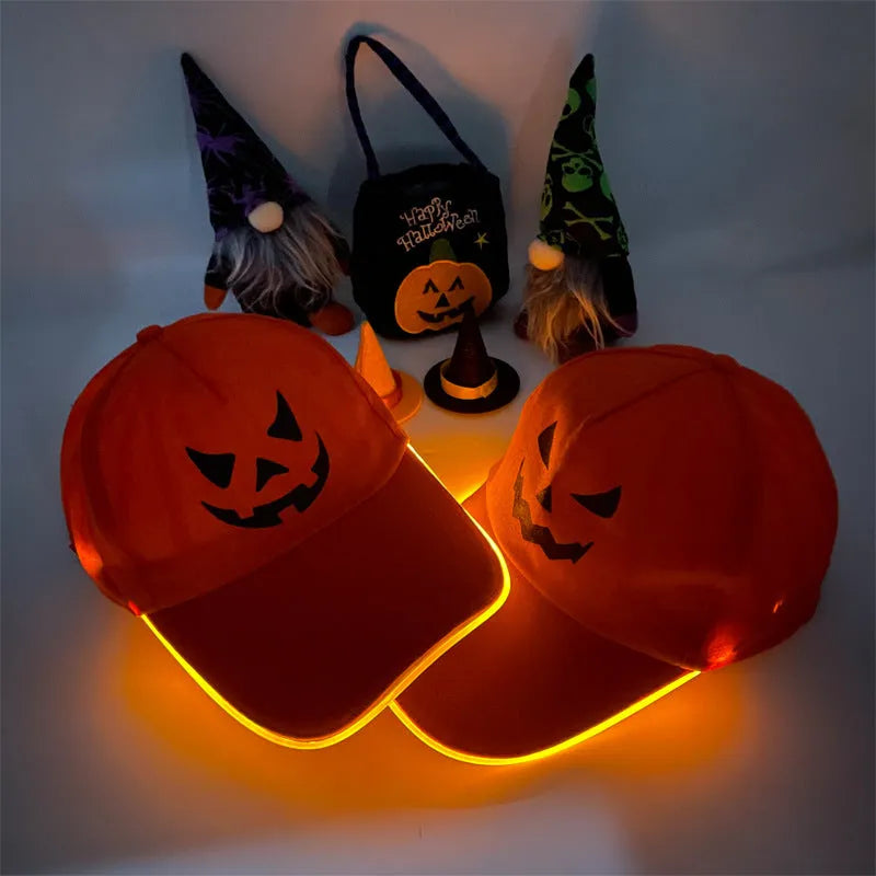 Halloween LED baseball cap with glowing coloured lights on a black cloth background.
