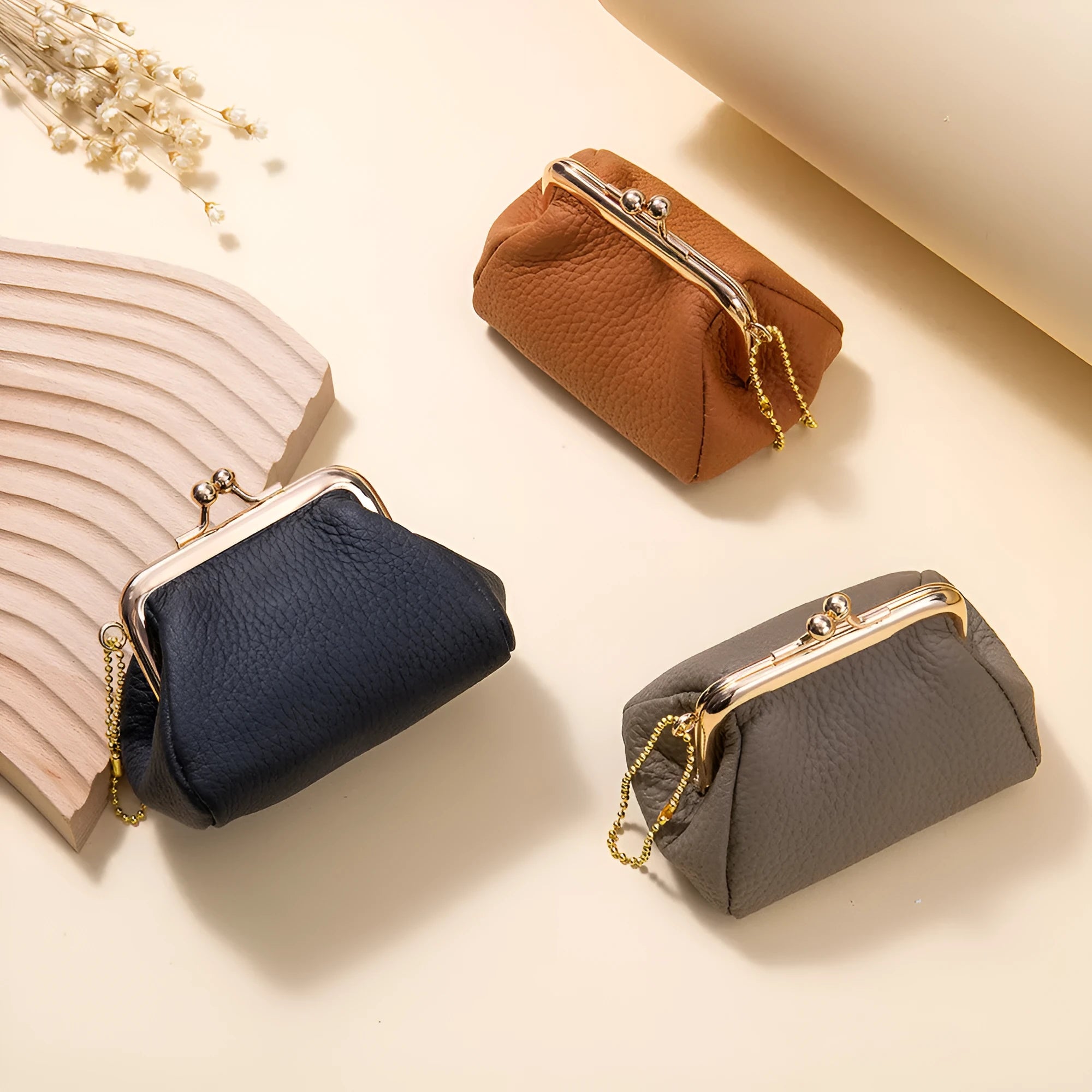 Genuine leather mini coin wallet in solid colour with visible sewing thread detail – urban simplicity design