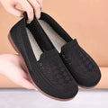 Women's beige low-top casual slip-on shoes with mesh upper and round toe.