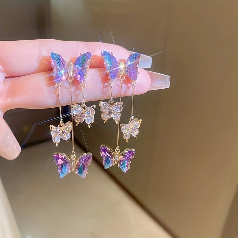 Silver Needle blue purple butterfly tassel earrings with crystal flowers on a 4.5cm alloy drop.