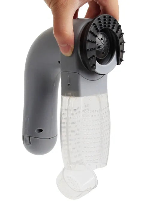Grey handheld pet hair vacuum cleaner with soft rubber grooming brush head